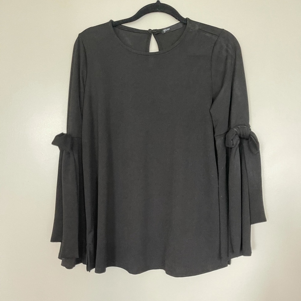 Black long sleeve top with bows